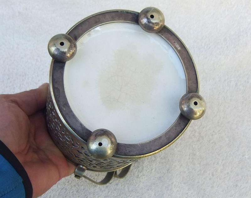 A VICTORIAN ERA PORCELAIN JAR WITH METAL FRAME , HANDLE AND LID MARKED EPNS