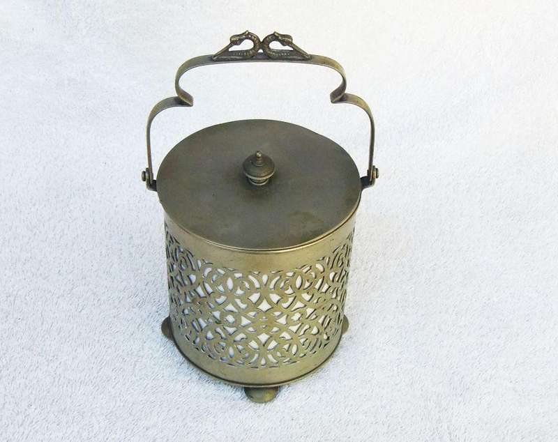 A VICTORIAN ERA PORCELAIN JAR WITH METAL FRAME , HANDLE AND LID MARKED EPNS