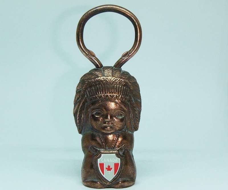 A VINTAGE CANADIAN FIGURAL BOTTLE OPENER