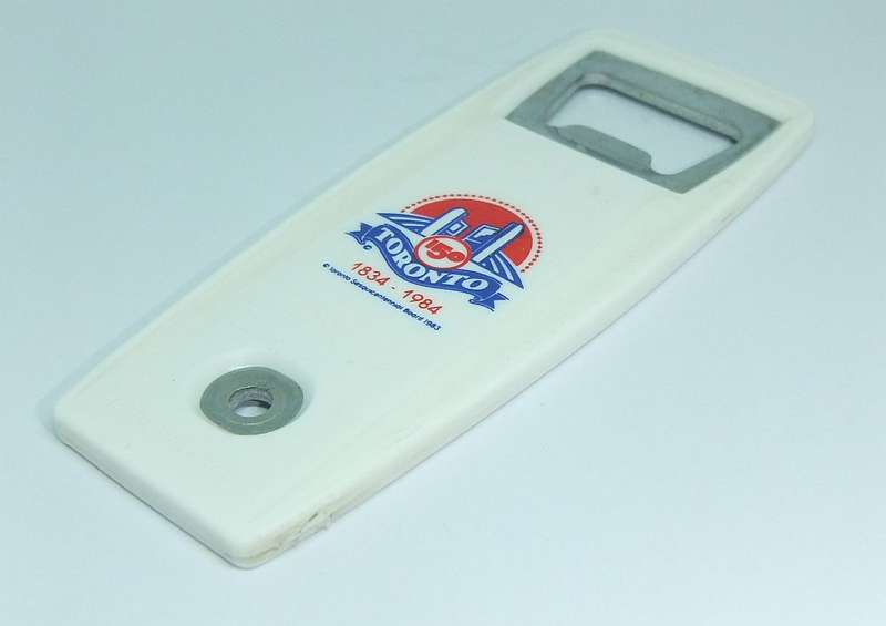 A VINTAGE BOTTLE OPENER MADE FOR THE 1984 COMMEMORATION OF TORONTO CANADA