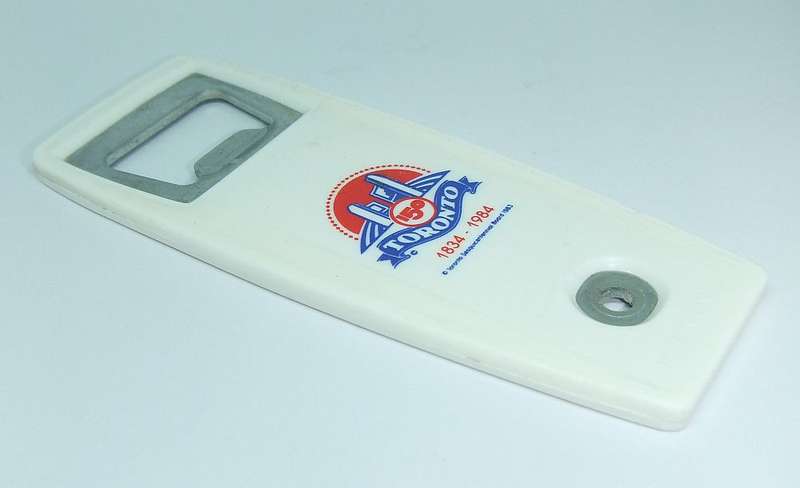 A VINTAGE BOTTLE OPENER MADE FOR THE 1984 COMMEMORATION OF TORONTO CANADA