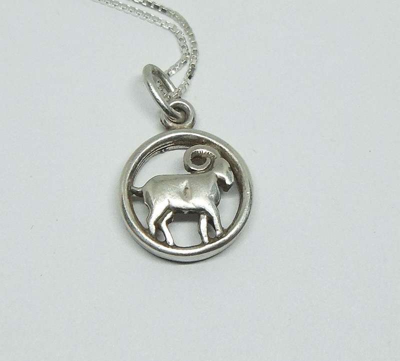 A COOL VINTAGE GERMAN SILVER ARIES PENDANT WITH A 42 CM STERLING SILVER NECKLACE !! FREE COMBINING !