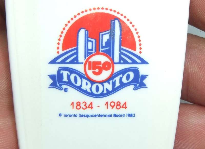 A VINTAGE BOTTLE OPENER MADE FOR THE 1984 COMMEMORATION OF TORONTO CANADA