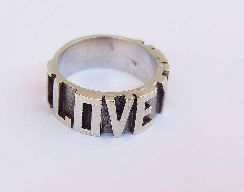 A UNIQUE THICK QUALITY SOLID STERLING SILVER RING WITH " I LOVE YOU " MOTIF !! MAYBE ONE OF A KIND !