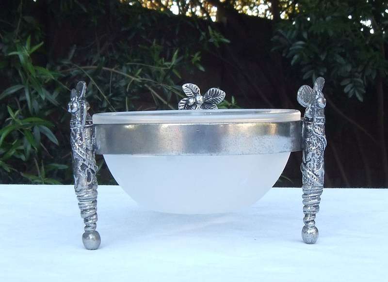 A STYLISH DESIGNER STAMPED COCONUT TREE MOTIF METAL STAND WITH GLASS BOWL