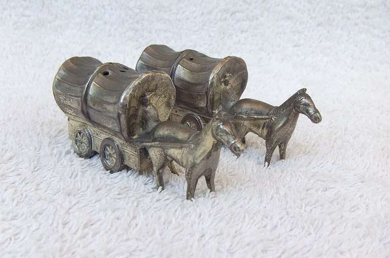 TOO CUTE !! A RARE PAIR OF VINTAGE METAL COWBOY WAGON SALT & PEPPER SHAKERS !! GREAT DETAIL !!