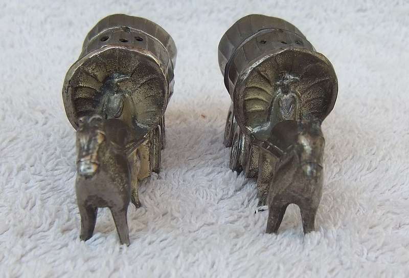 TOO CUTE !! A RARE PAIR OF VINTAGE METAL COWBOY WAGON SALT & PEPPER SHAKERS !! GREAT DETAIL !!