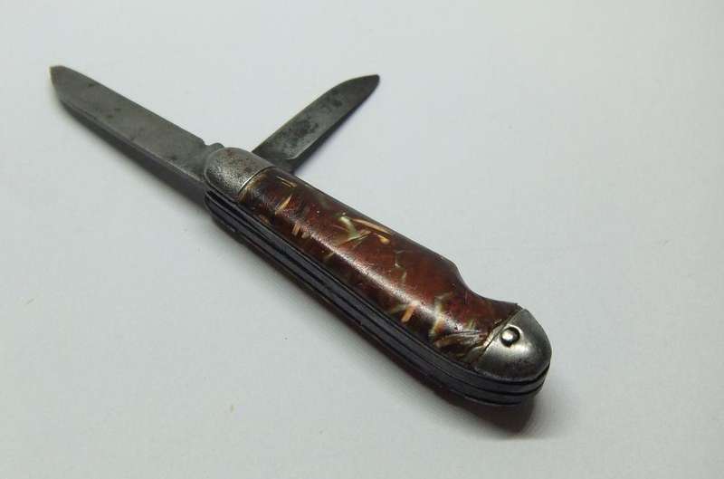 A VERY OLD TICKEY POCKET SIZED KNIFE TOOL USED FOR CLEANING SMOKING PIPES IN THIS CASE ...TOO CUTE !