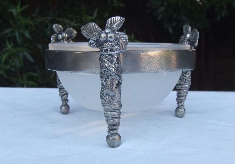 A STYLISH DESIGNER STAMPED COCONUT TREE MOTIF METAL STAND WITH GLASS BOWL
