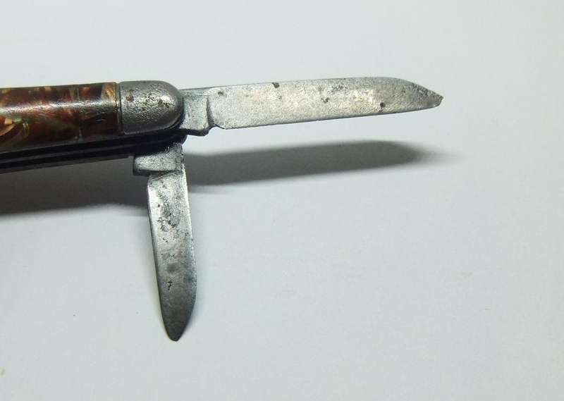 A VERY OLD TICKEY POCKET SIZED KNIFE TOOL USED FOR CLEANING SMOKING PIPES IN THIS CASE ...TOO CUTE !
