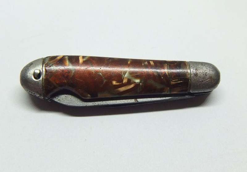 A VERY OLD TICKEY POCKET SIZED KNIFE TOOL USED FOR CLEANING SMOKING PIPES IN THIS CASE ...TOO CUTE !