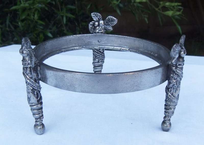 A STYLISH DESIGNER STAMPED COCONUT TREE MOTIF METAL STAND WITH GLASS BOWL