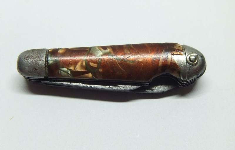 A VERY OLD TICKEY POCKET SIZED KNIFE TOOL USED FOR CLEANING SMOKING PIPES IN THIS CASE ...TOO CUTE !