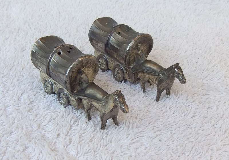 TOO CUTE !! A RARE PAIR OF VINTAGE METAL COWBOY WAGON SALT & PEPPER SHAKERS !! GREAT DETAIL !!