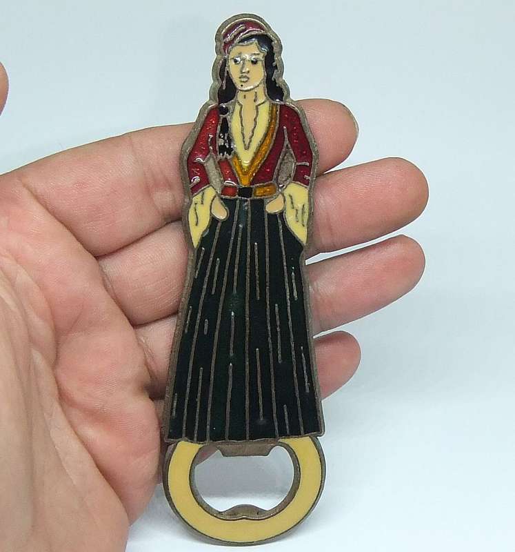A VINTAGE ENAMEL ON BRONZE LADY FIGURE BOTTLE OPENER MADE IN GREECE