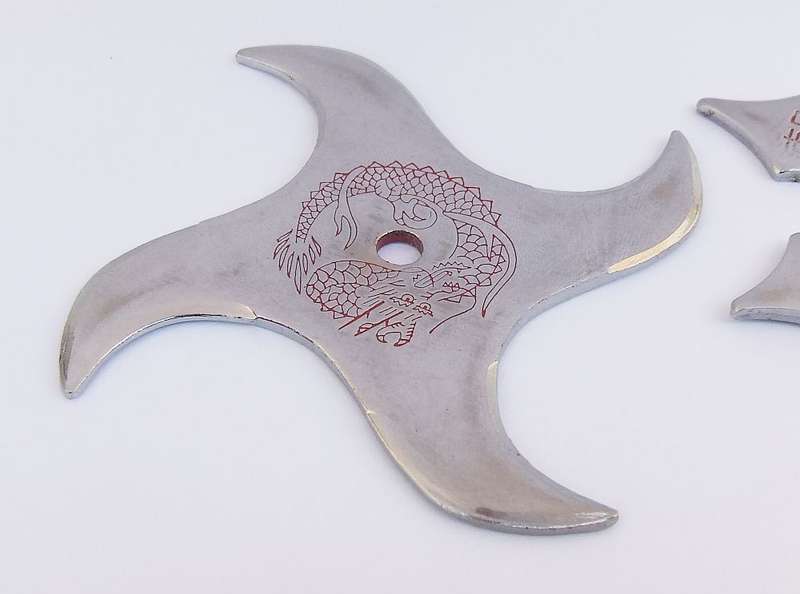 TWO TOTALLY COOL VINTAGE JAPANESE MADE NINJA STARS WITH DRAGON MOTIF !!