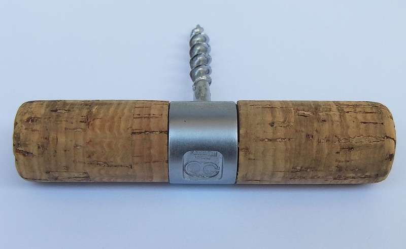 A VINTAGE CORKSCREW BY AMORIN CORK WITH CORK HANDLE