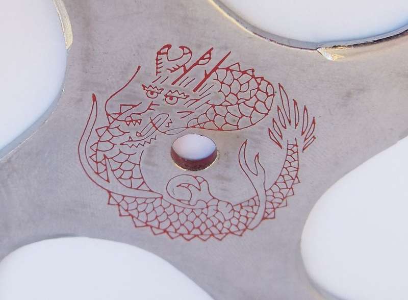 TWO TOTALLY COOL VINTAGE JAPANESE MADE NINJA STARS WITH DRAGON MOTIF !!