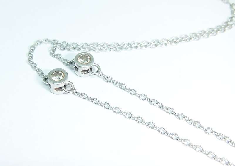WOW !! AN ELEGANT STERLING SILVER NECKLACE SET WITH FACETED CZ STONES AND A 5 CM EXTENDER CHAIN !!