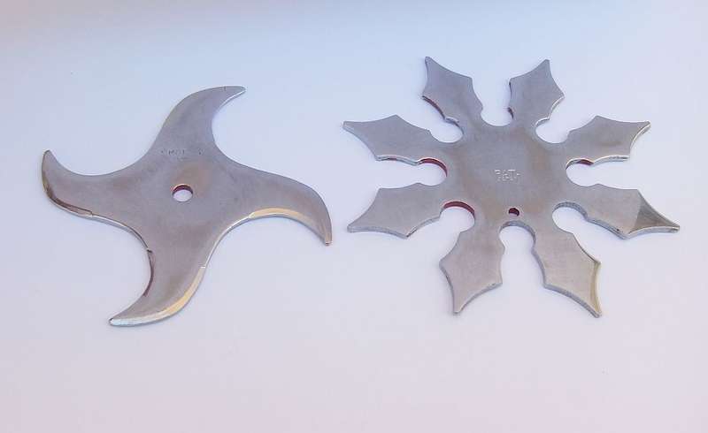 TWO TOTALLY COOL VINTAGE JAPANESE MADE NINJA STARS WITH DRAGON MOTIF !!
