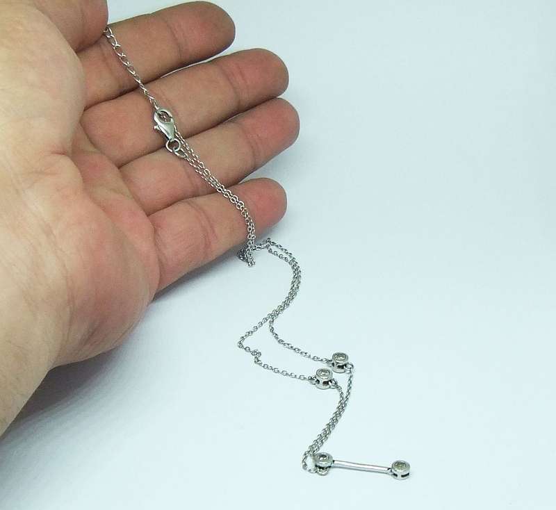 WOW !! AN ELEGANT STERLING SILVER NECKLACE SET WITH FACETED CZ STONES AND A 5 CM EXTENDER CHAIN !!