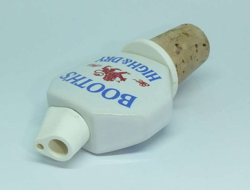 A VINTAGE PORCELAIN ALCOHOL POURER ADVERTISING BOOTH`S GIN