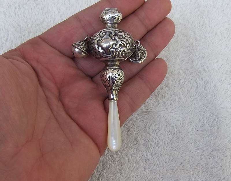 LOOK !! A STUNNING RARE OLD BABY RATTLE WITH BELLS AND MOTHER OF PEARL HANDLE !! WOW !!