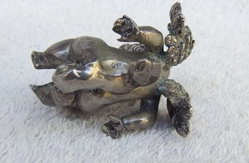 A PAIR OF CHERUB ORNAMENTS DIPPED IN A SILVER METAL FINISH - NO MARKINGS