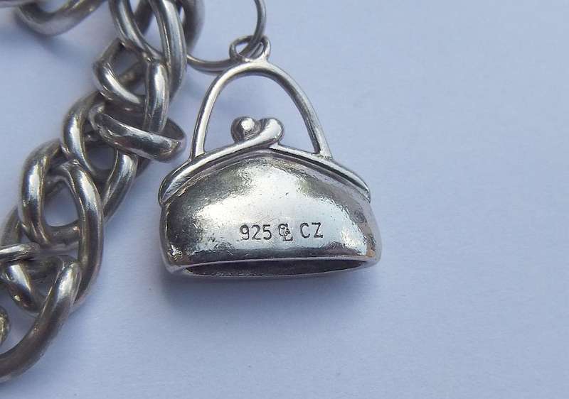Sterling Silver Charm Bracelet with Designer Charm - Good Quality Piece