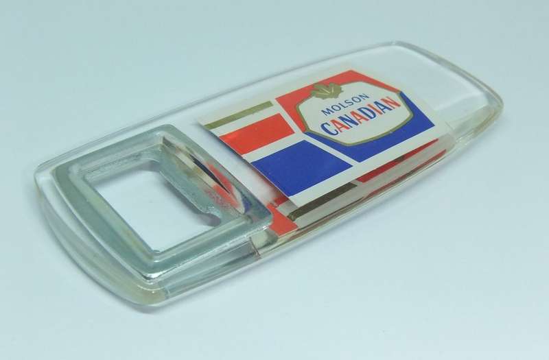 A VINTAGE BOTTLE OPENER ADVERTISING MOLSON CANADA