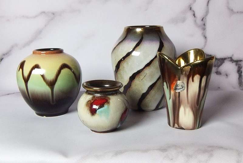 A STUNNING COLLECTION OF VINTAGE MID CENTURY LAVA GLAZE TYPE WEST GERMAN POTTERY VASES