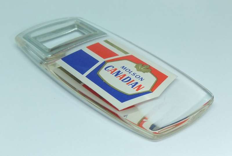 A VINTAGE BOTTLE OPENER ADVERTISING MOLSON CANADA