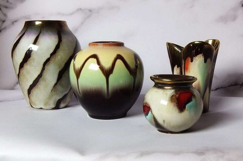 A STUNNING COLLECTION OF VINTAGE MID CENTURY LAVA GLAZE TYPE WEST GERMAN POTTERY VASES