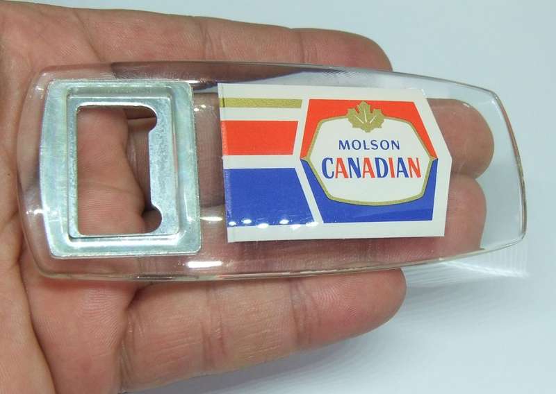 A VINTAGE BOTTLE OPENER ADVERTISING MOLSON CANADA