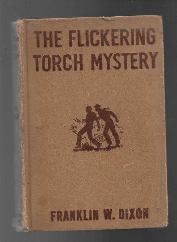 THE FLICKERING TORCH MYSTERY- FRANKLIN W. DIXON (HARDY BOYS)