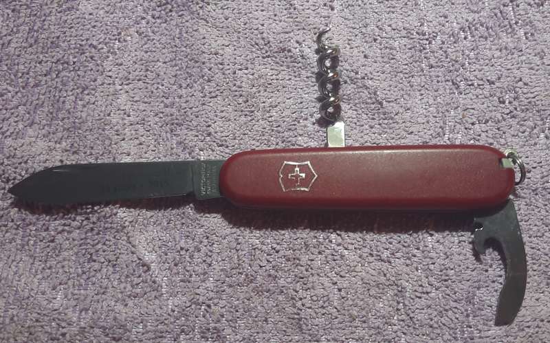 Victorinox - Recruit with Red Nylon Scales condition and tools as per pictures