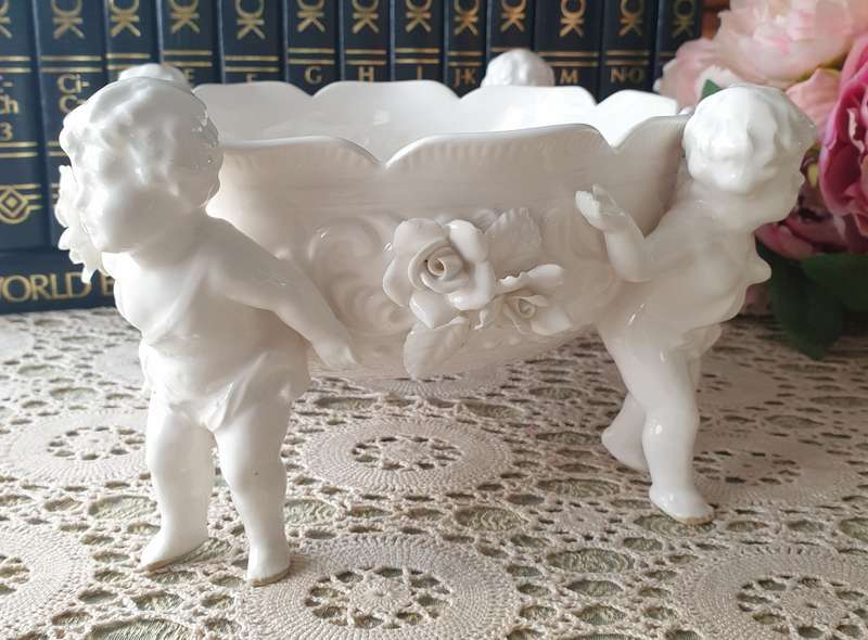 White Italian Continental blanc de Chine center bowl depicting four putti Cherubs + Small Vase