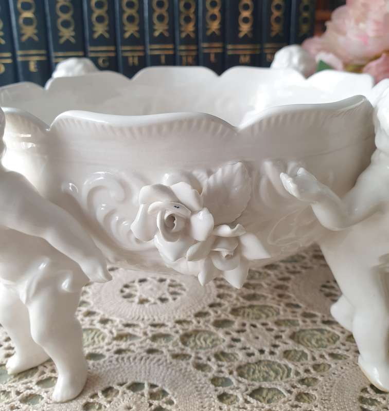White Italian Continental blanc de Chine center bowl depicting four putti Cherubs + Small Vase