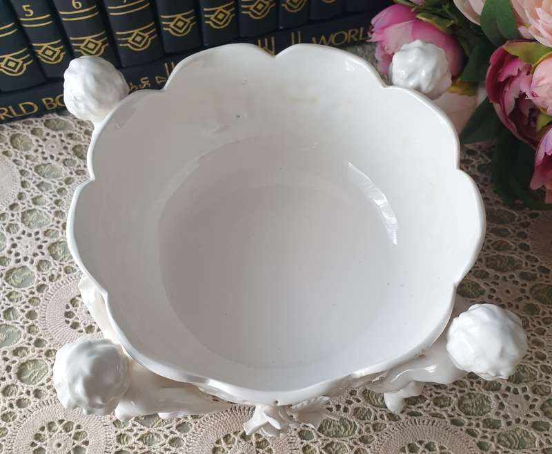 White Italian Continental blanc de Chine center bowl depicting four putti Cherubs + Small Vase