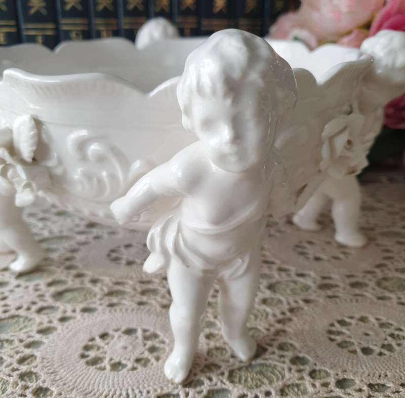 White Italian Continental blanc de Chine center bowl depicting four putti Cherubs + Small Vase