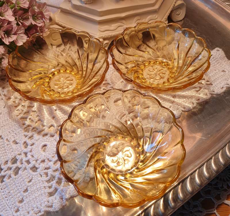 3 SMALL AMBER BOWLS