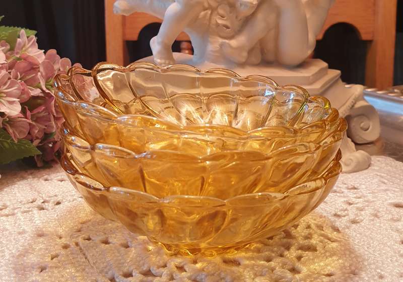 3 SMALL AMBER BOWLS