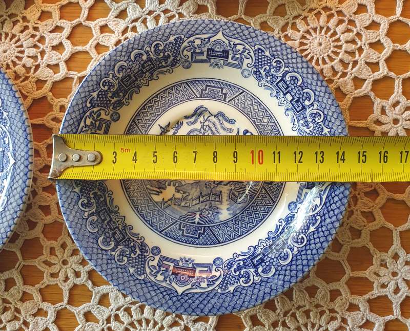 6 VNT BLUE AND WHITE Saucers