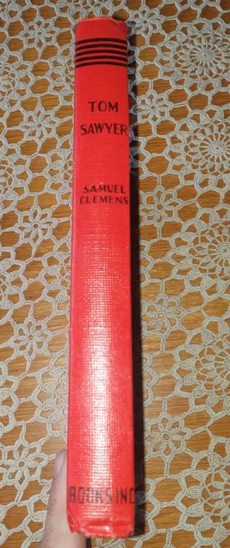 The Adventures of Tom Sawer by Samuel L Clemens    mid 1900's
