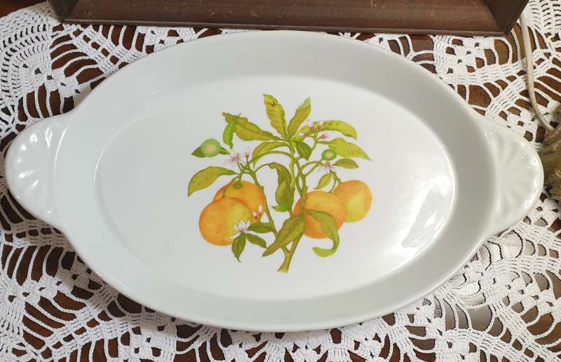 serving platter marked "Tradition CNP France," likely dating back to the 1970s