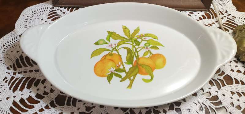 serving platter marked "Tradition CNP France," likely dating back to the 1970s
