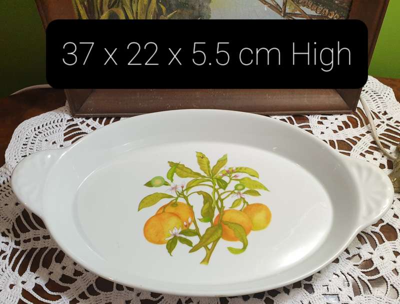 serving platter marked "Tradition CNP France," likely dating back to the 1970s