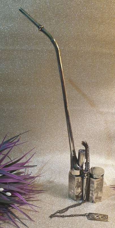 A Chinese white metal opium pipe
