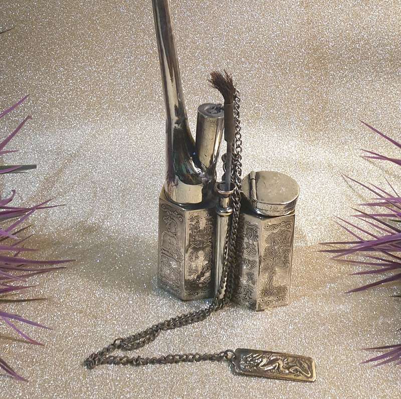 A Chinese white metal opium pipe
