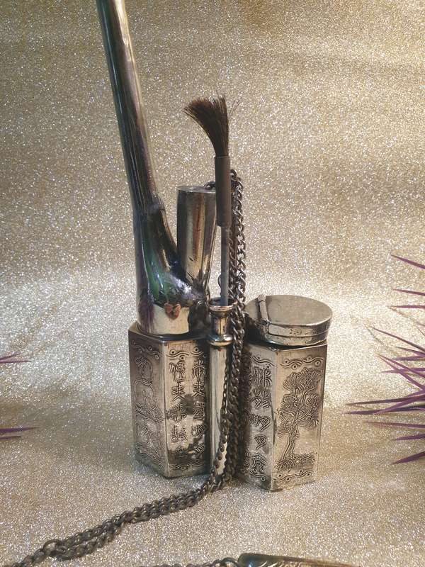 A Chinese white metal opium pipe